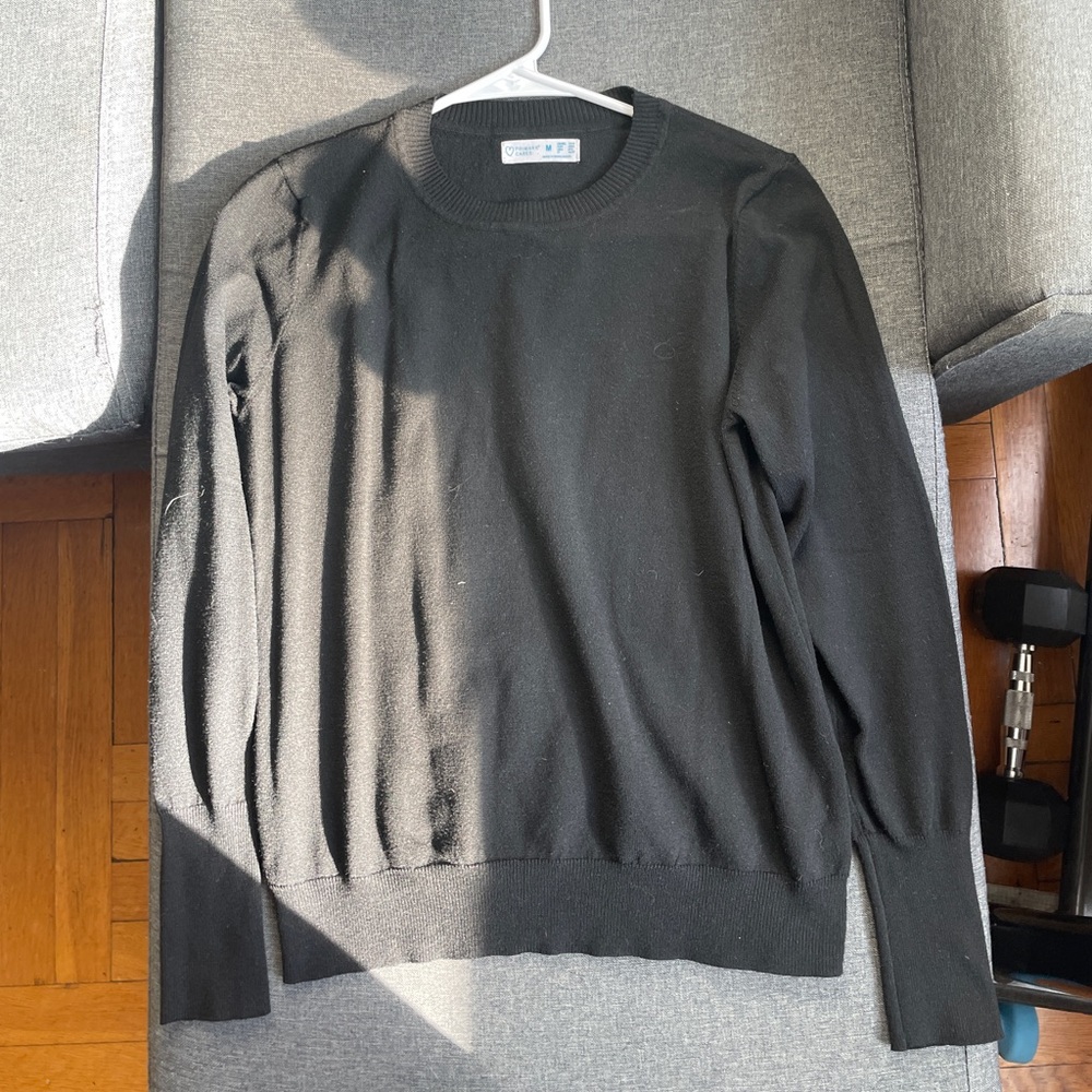 Black crew neck sweater